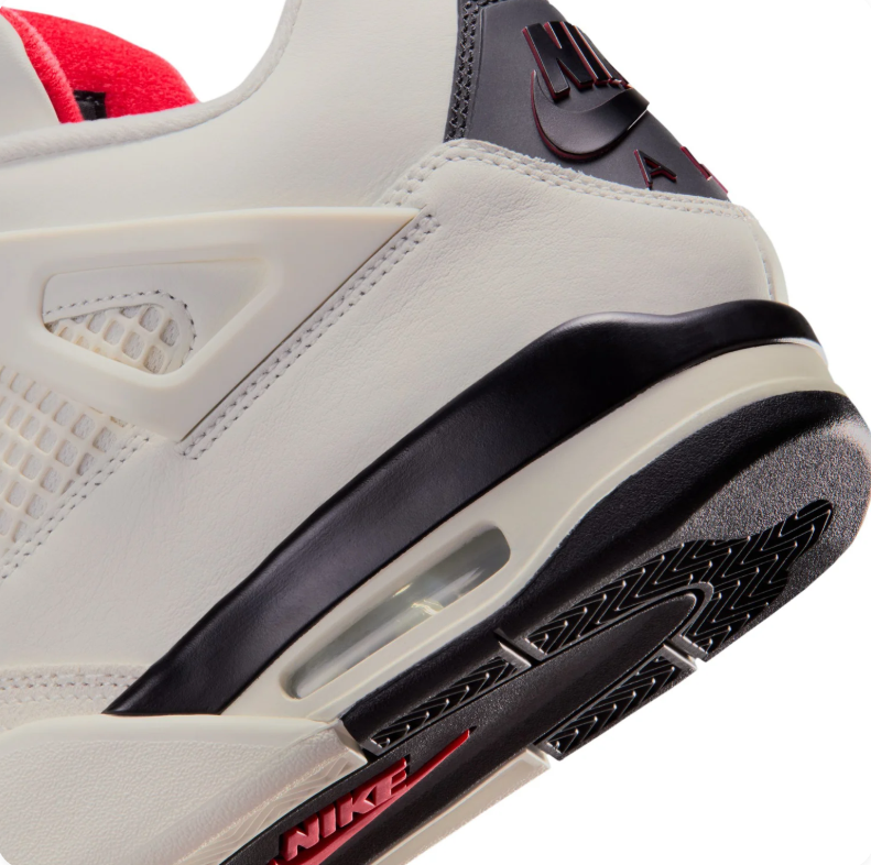 Air Jordan 4 Sneakers - Off-White and Black with Red Accents